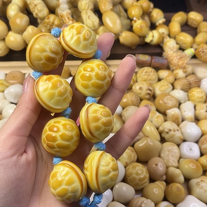 菩提根/象牙果吊坠瑕疵富甲手持