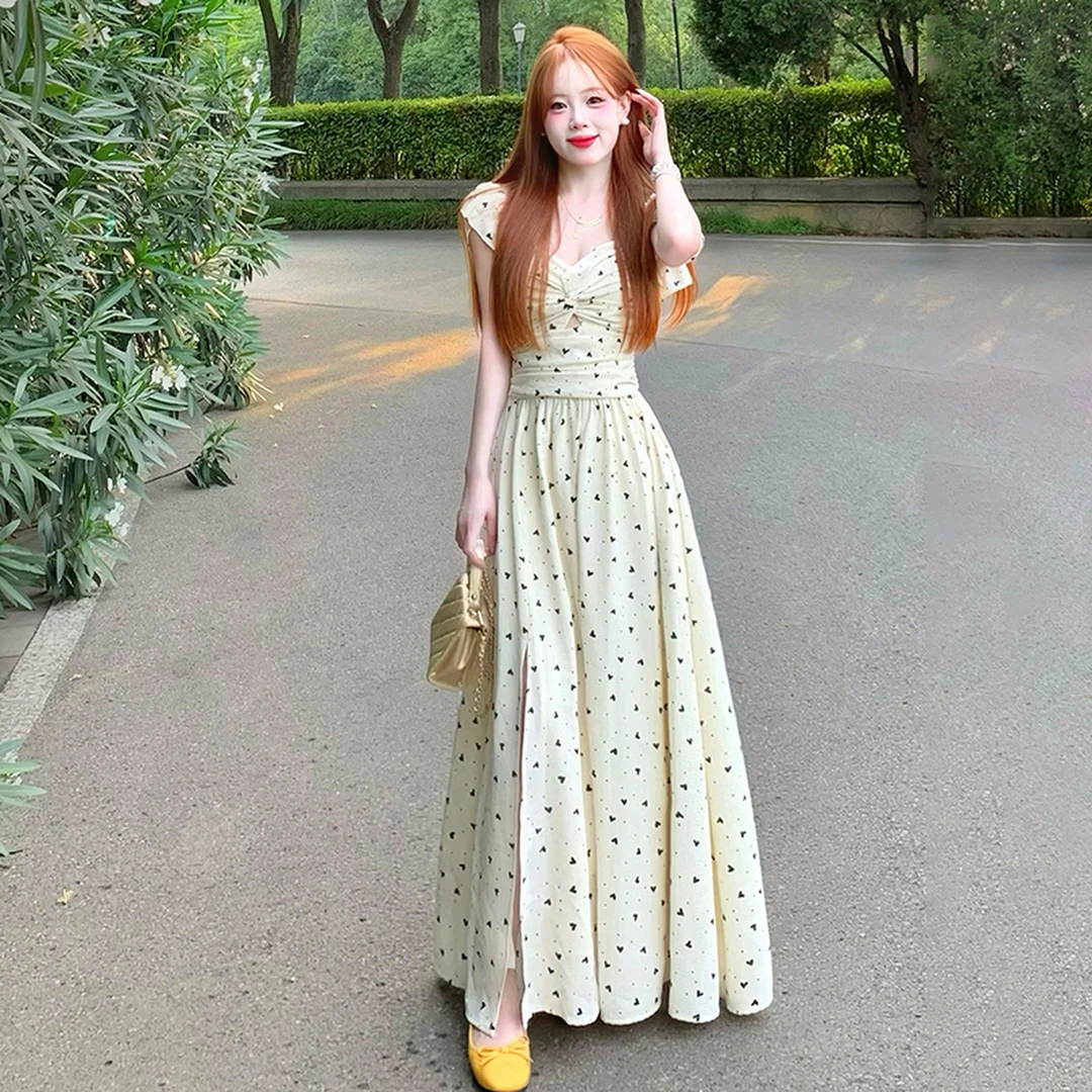 茶歇法式白色波点小飞袖连衣裙子女夏季2025新款温柔风高级感长裙