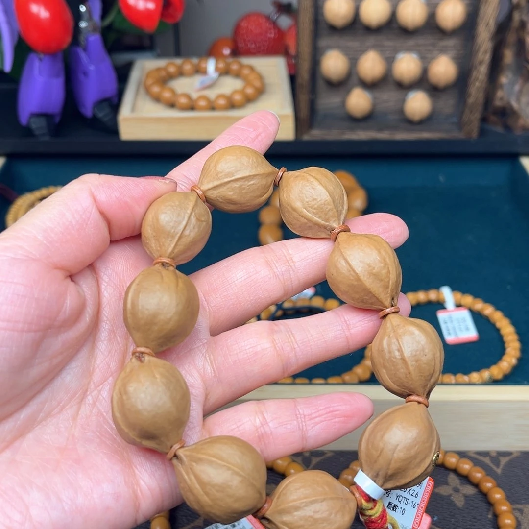 橄榄核手串铁素2.0*2.6梅林