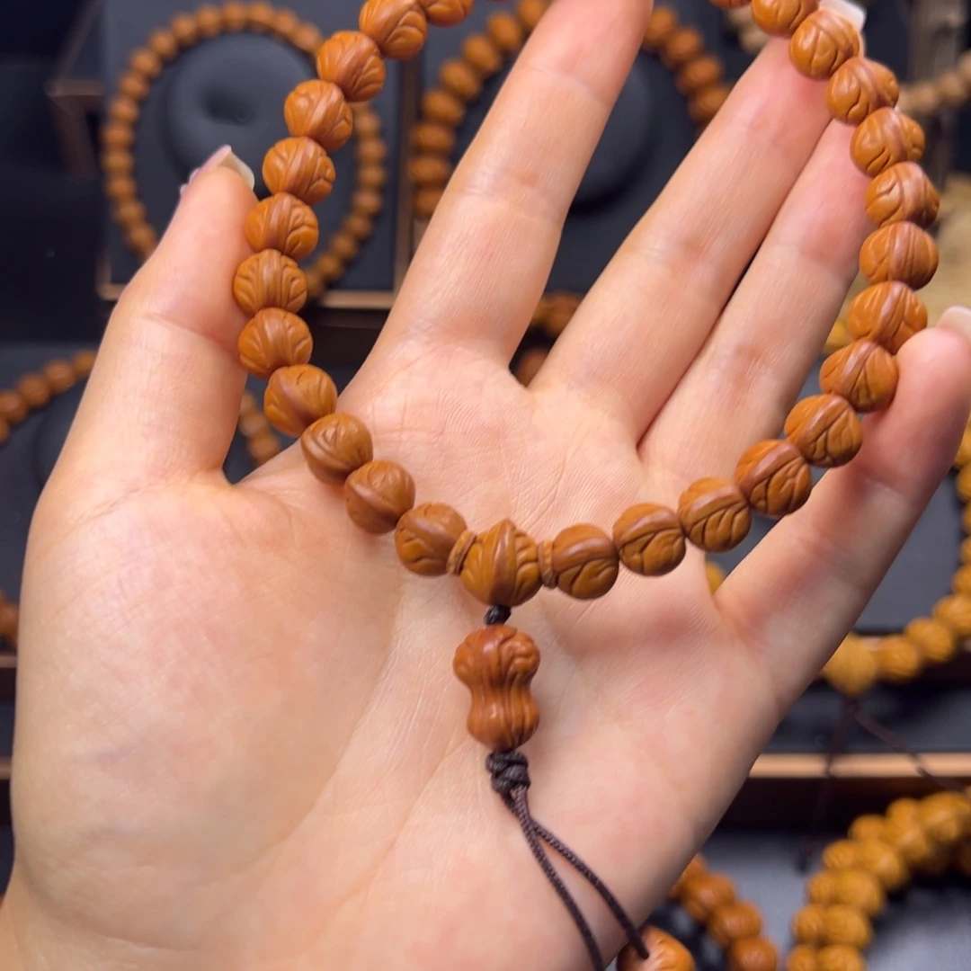 十***四桃核手串野生玉龙脊10