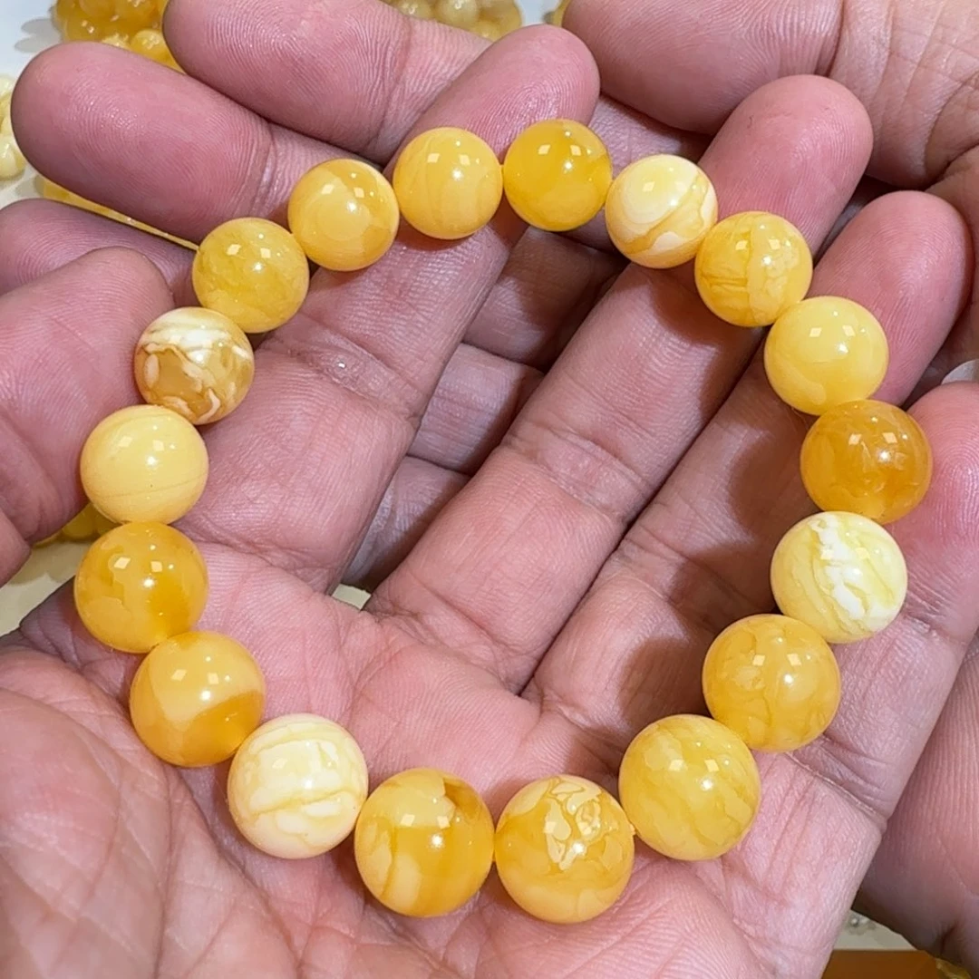 琥珀未镶嵌珠宝奇石12m焦皮橘黄花蜡多宝圆珠串16.98