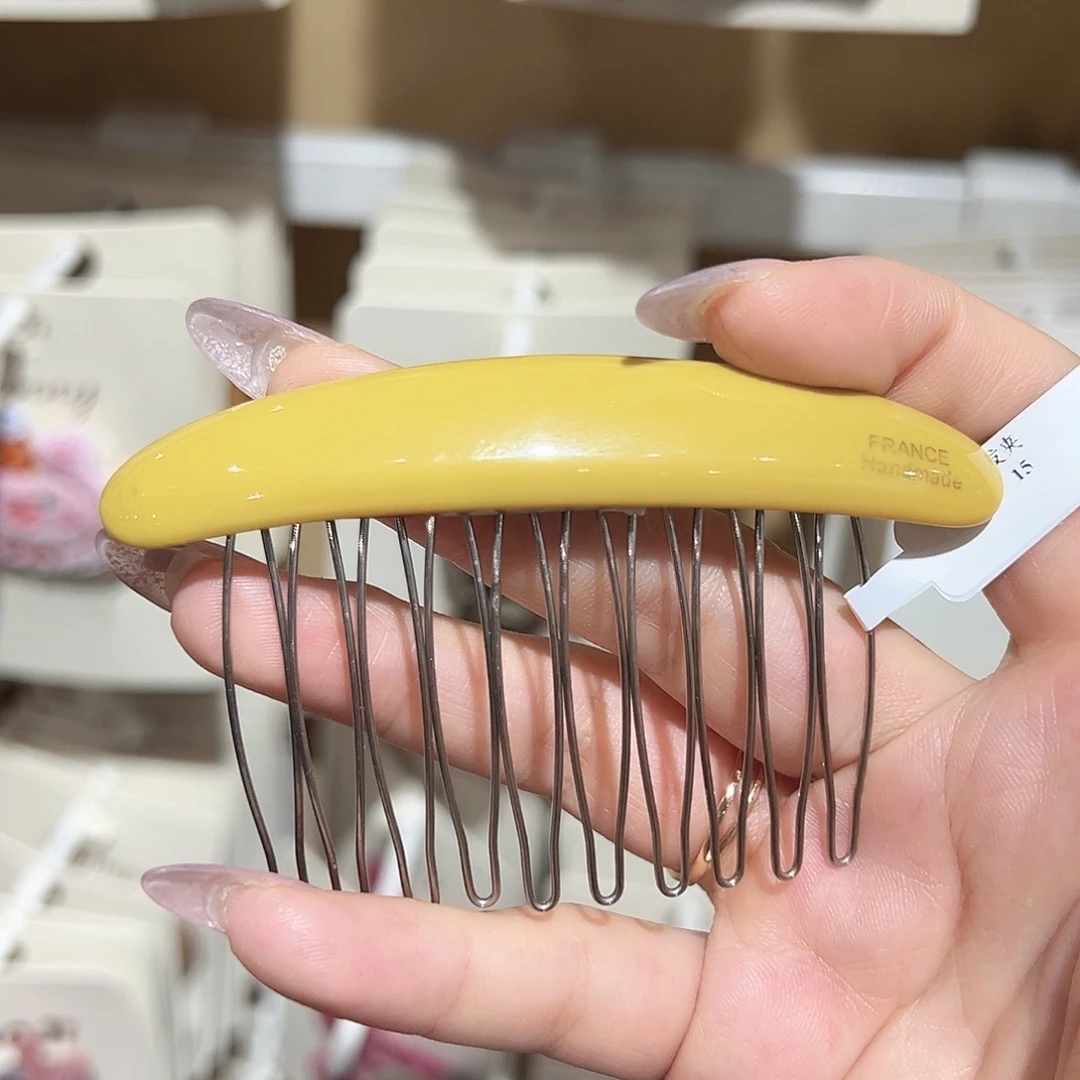 皮质铁合金黄色插梳