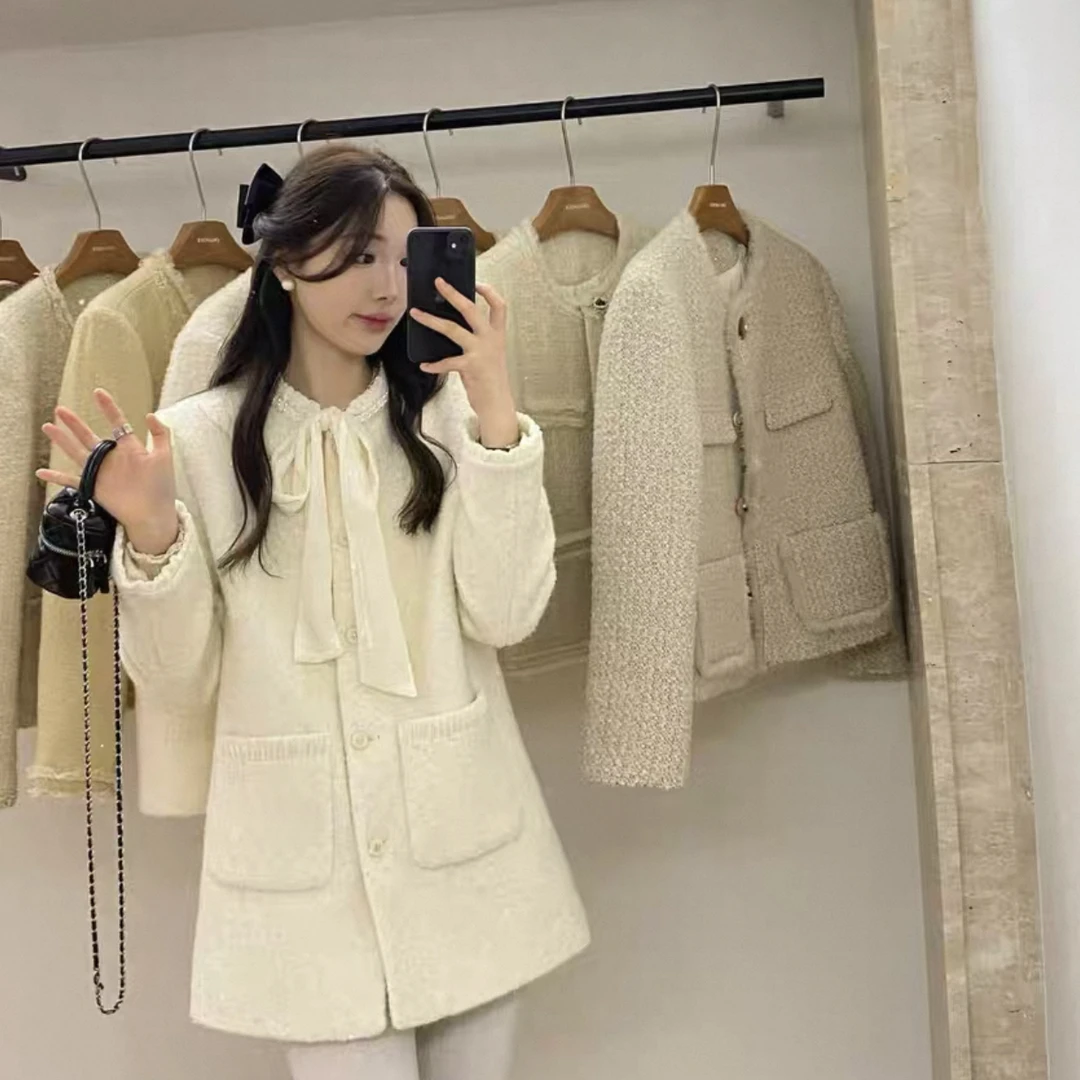 恩熙·韩版名媛风蝴蝶结小香羽绒服外套57899