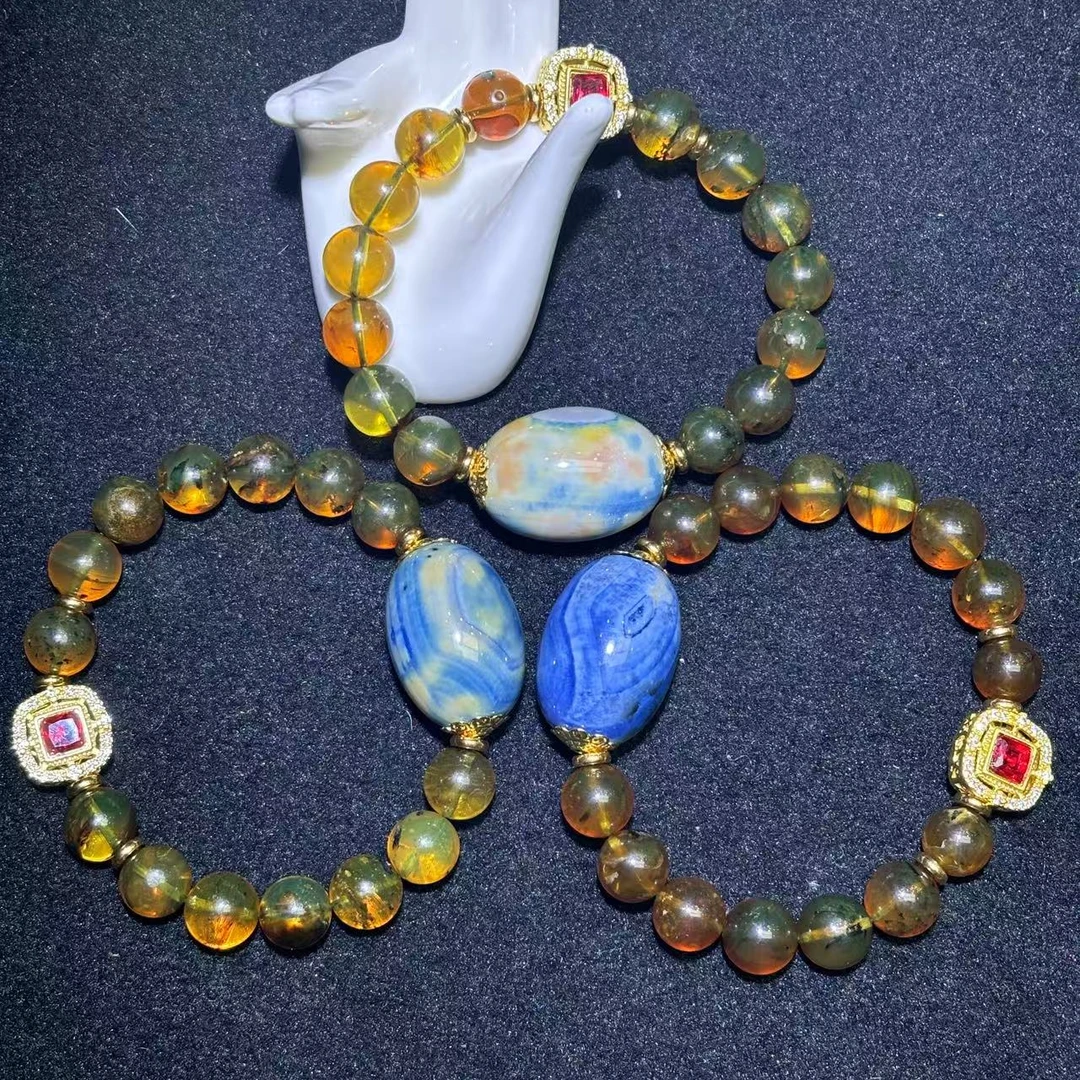 M2825-多宝九金九品灵草珀琥珀手串-多样性发其一