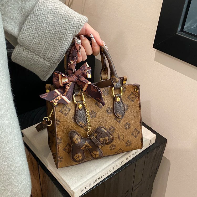 纯色单肩包百搭小众夏季气质水桶包印花经典斜跨方形菜篮子包轻奢