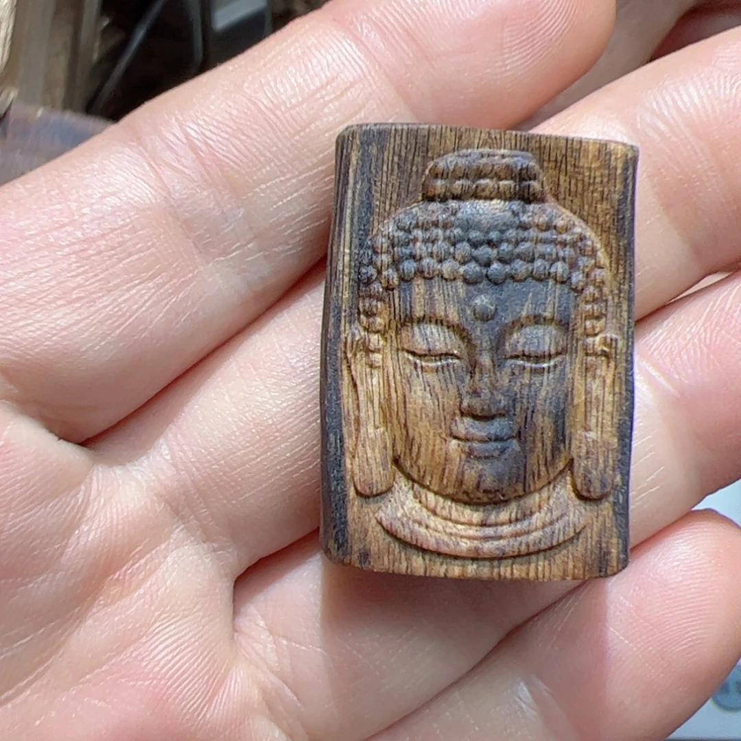 沉香吊坠白棋佛头3.8克