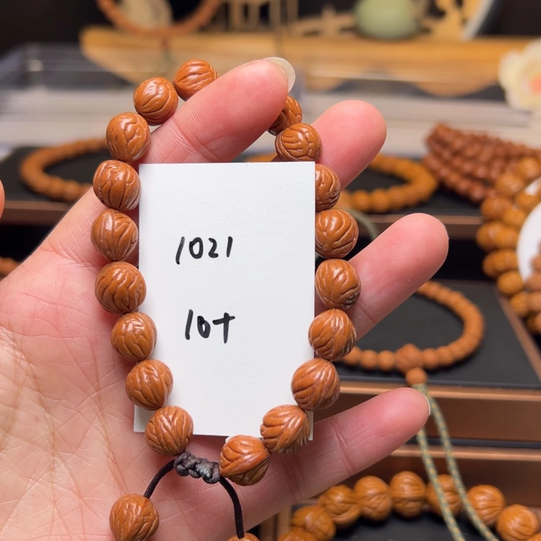 謹***言木质类小奶豆手串10左右