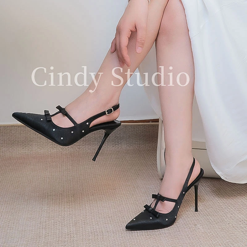 蝴蝶结一字扣带尖头气质法式细跟高跟鞋后空包头凉鞋性感绝美黑色