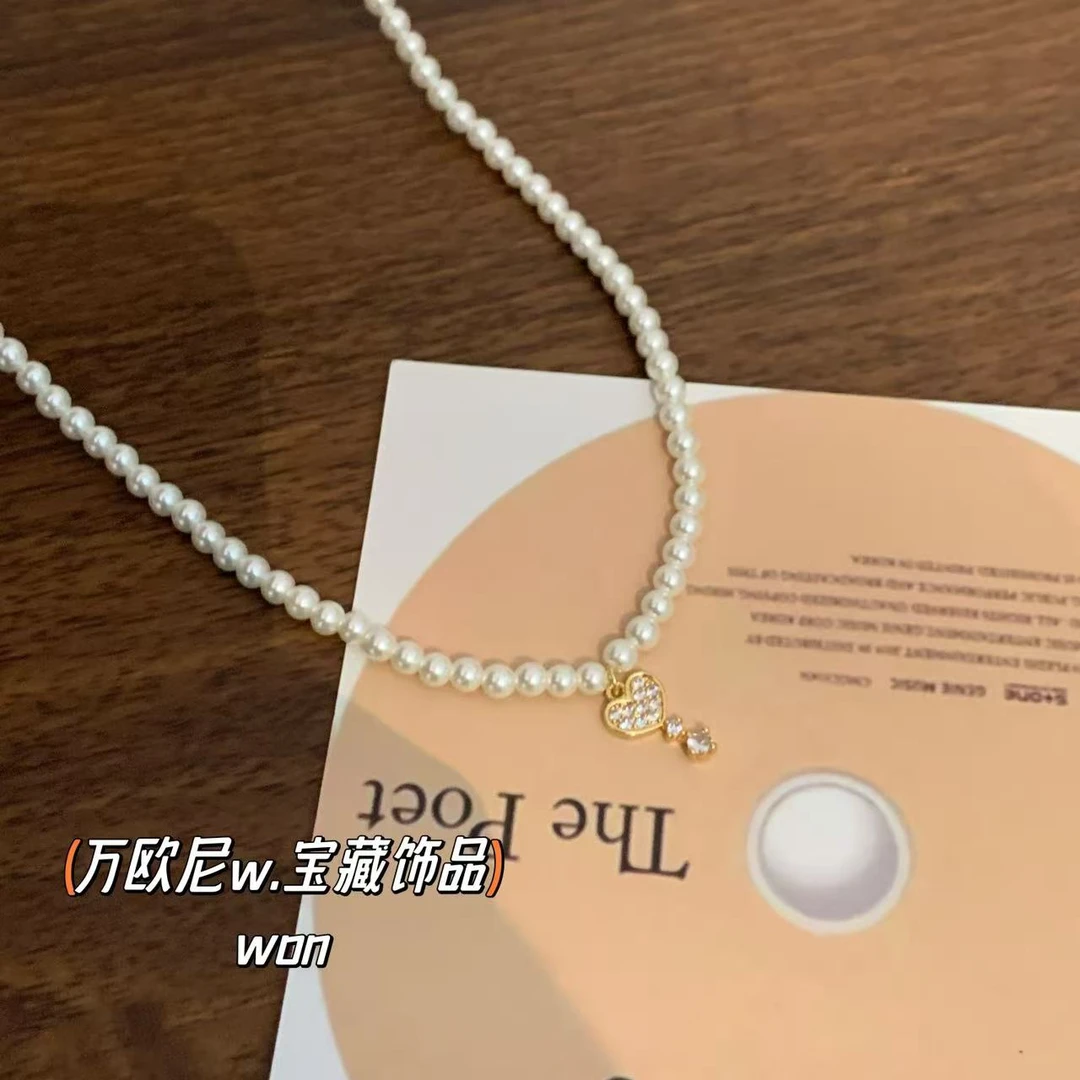 铜合金仿珍珠项链 CHANGE x 心心水滴项链 法式百搭气质 柜 X140