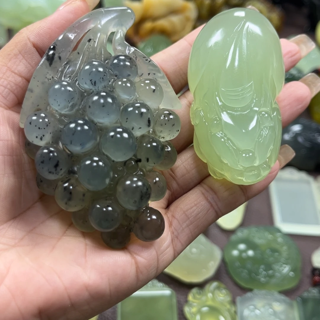孤***灵未镶嵌蛇纹石玉手把件