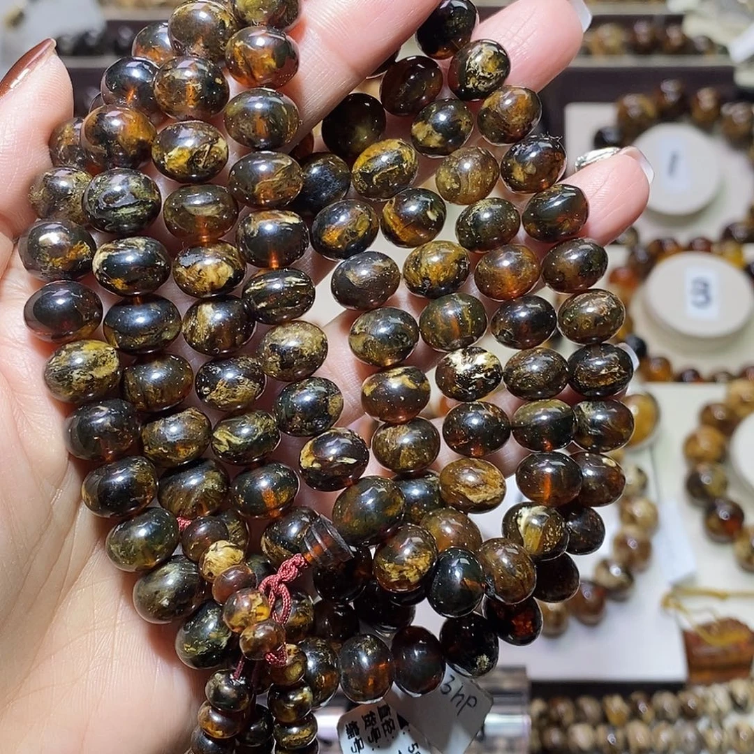 梦***翔琥珀未镶嵌裸石黑花10+