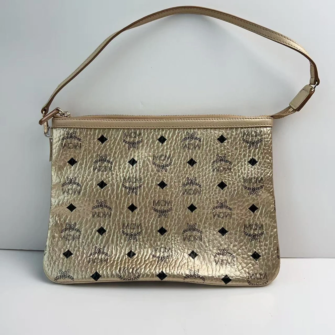 95新 MCM MCM金色洗簌手拿包