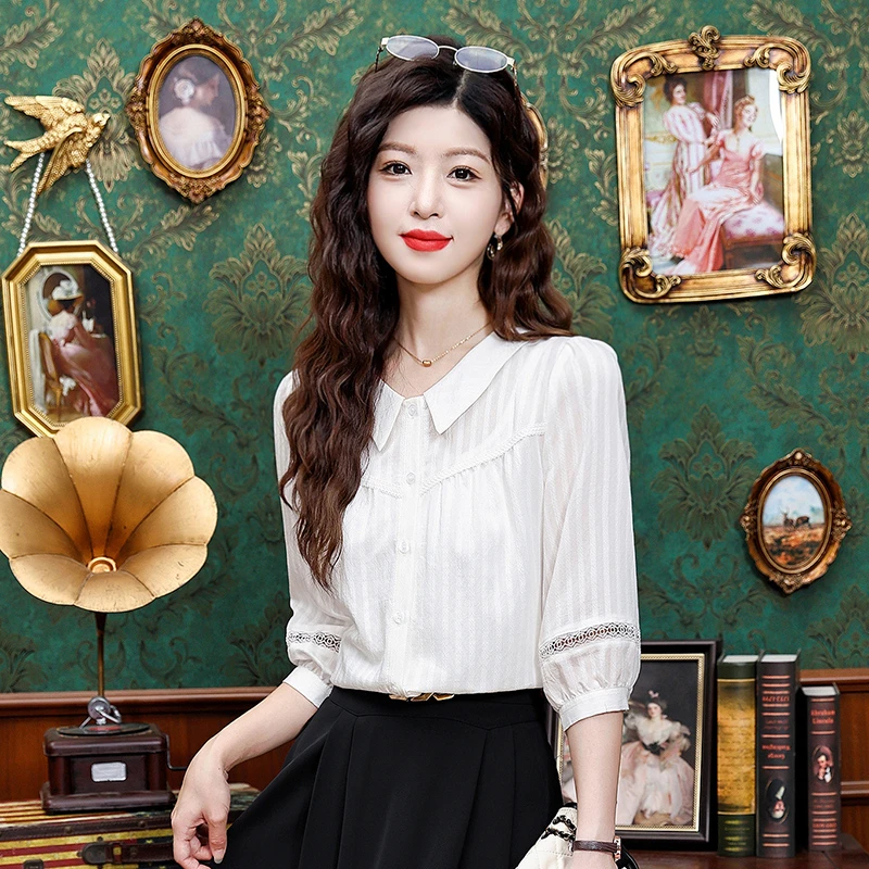新款七分衬衫女设计感小众气质宽松洋气百搭娃娃领上衣