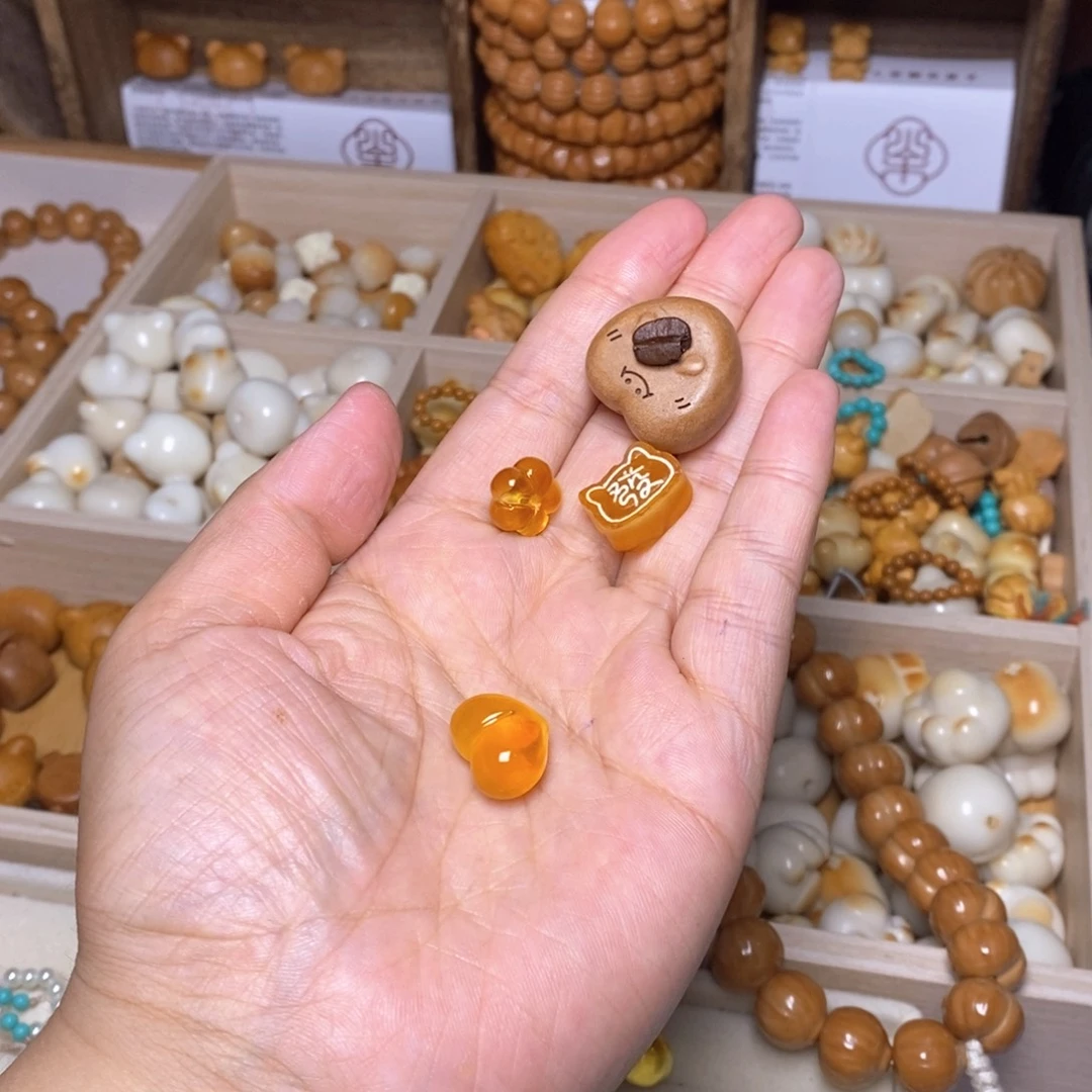 猫***哒吊坠猴头核桃蜜心1.47发牌1.23小花橄榄核咖啡豆爱心