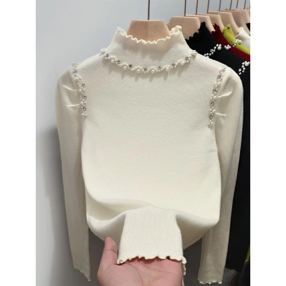 木耳边珍珠半高领设计感打底衫女2025秋冬宽松内搭上衣米白色毛衣