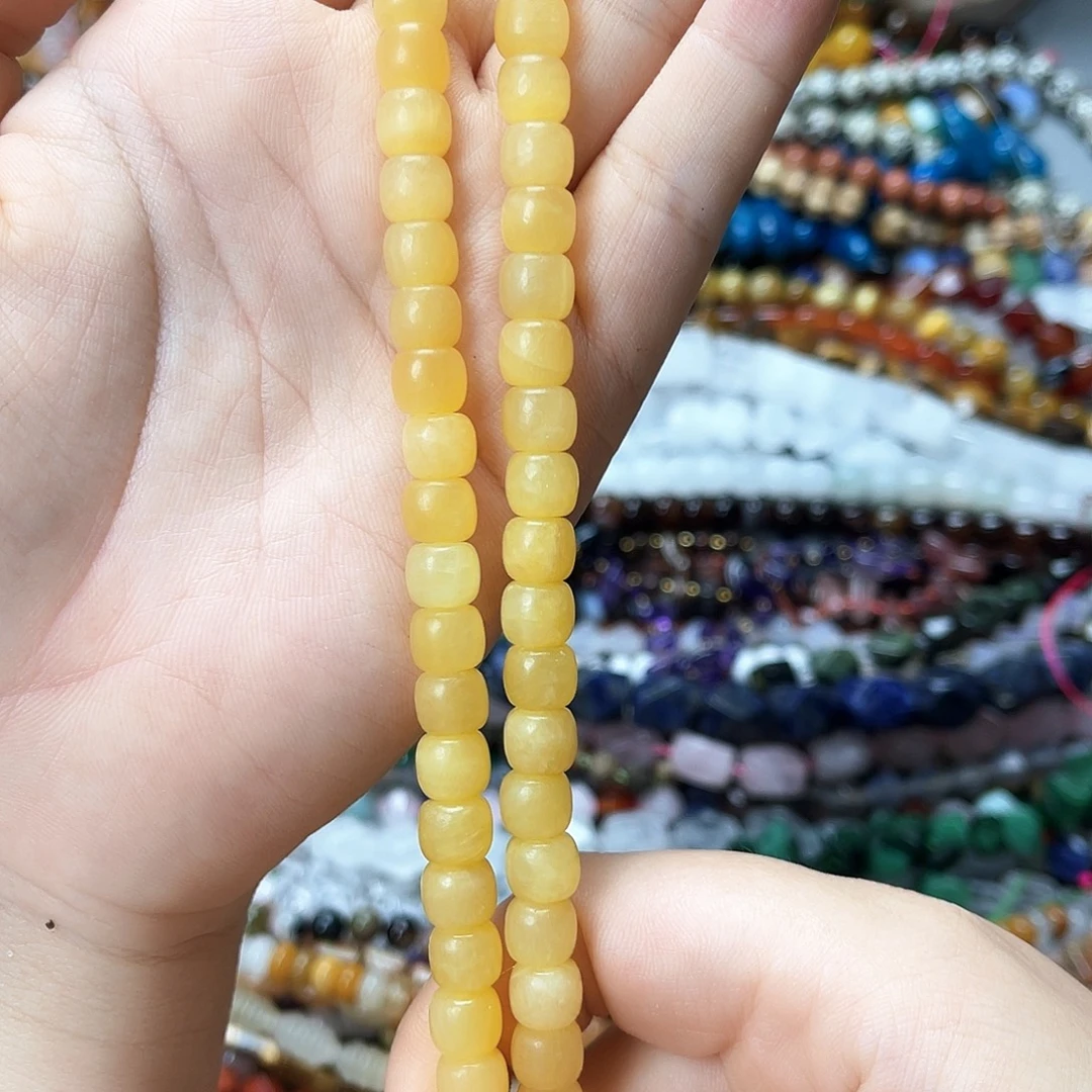 湖***。玛瑙/玉髓未镶嵌珠宝半成品卡8米黄玉老型珠一条