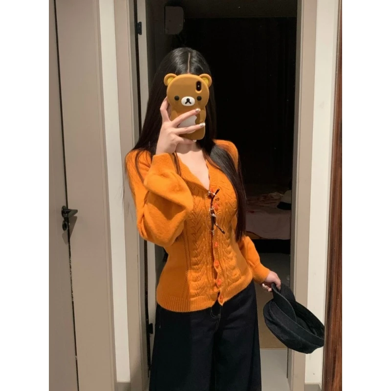 2025超火减龄设计感小众多巴胺独特漂亮上衣橘色长袖针织衫女早秋