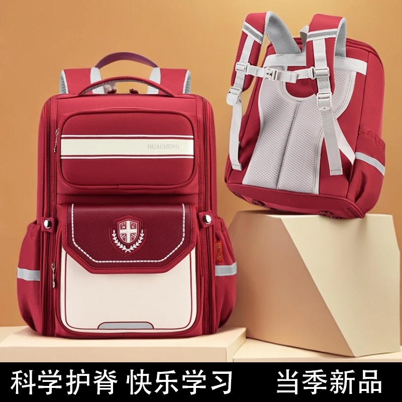 新款小学生书包女孩一二三到六年级男减负护脊轻便大容量儿童背包
