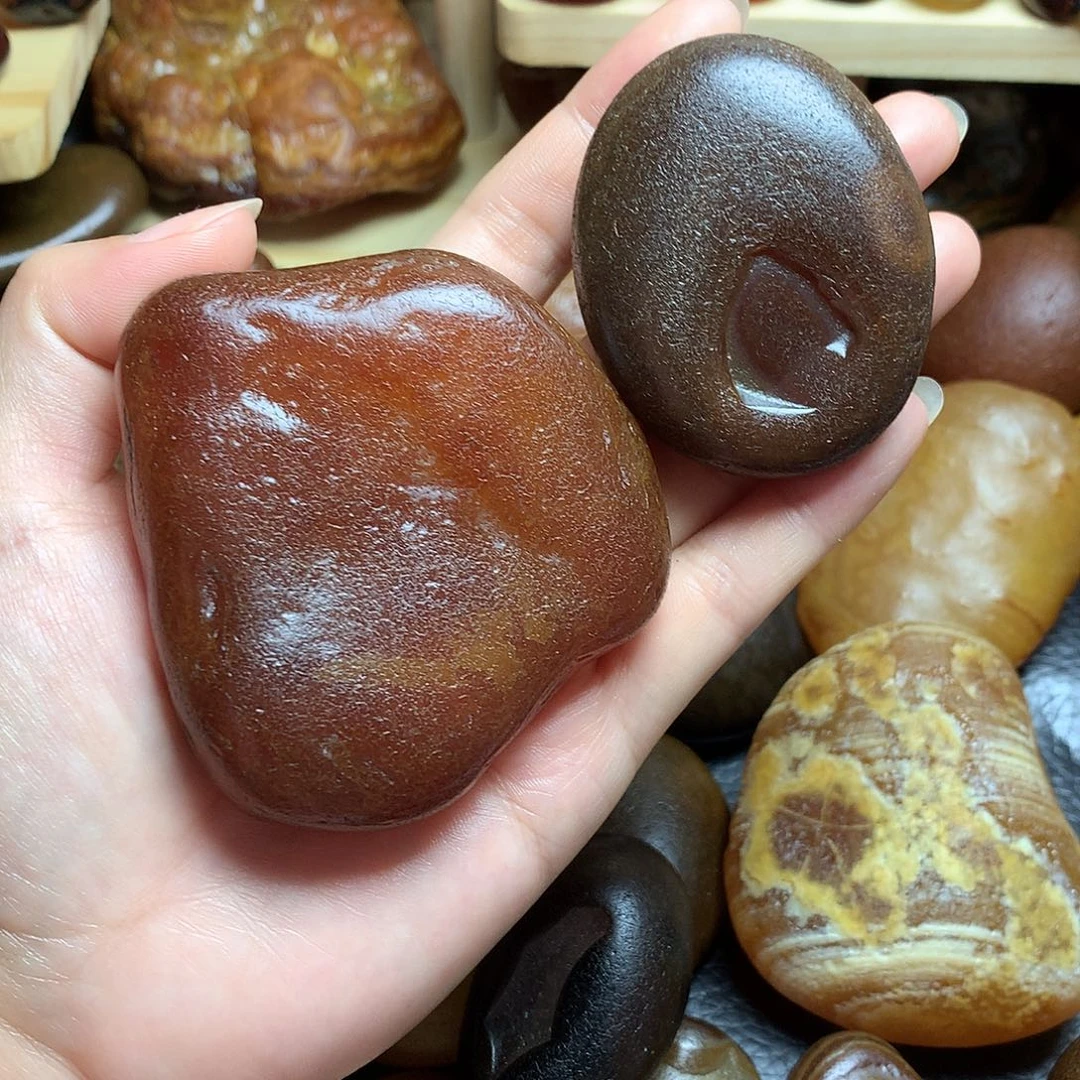 玛瑙原石平板手把件