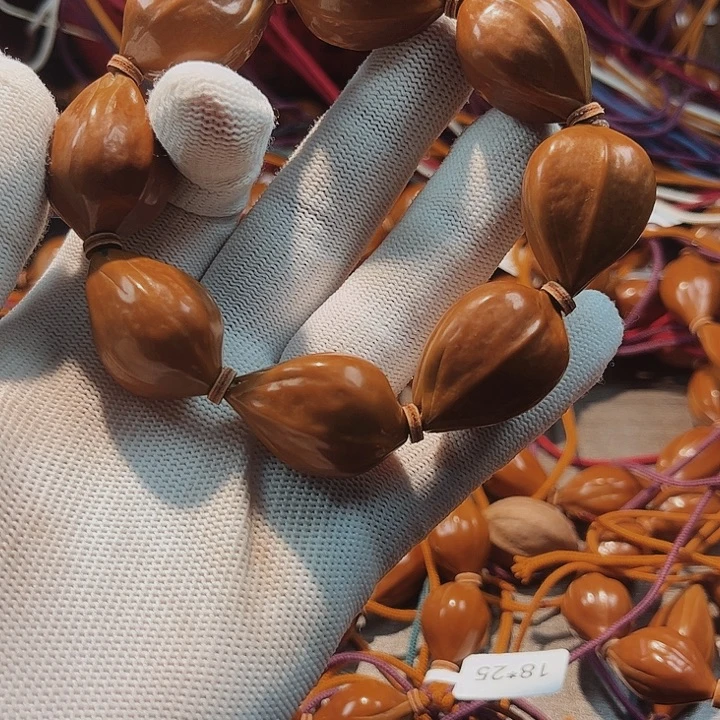 凯***店吊坠橄榄核1111111