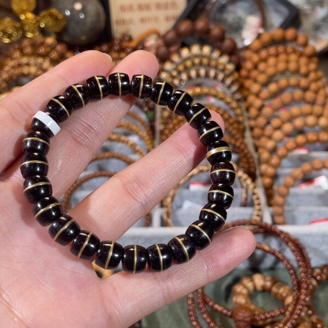 手串紫金鼠姜****?椰蒂一线天