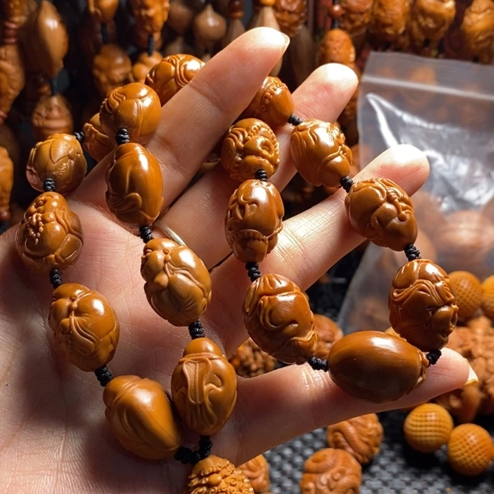 橄榄核吊坠弥勒手持