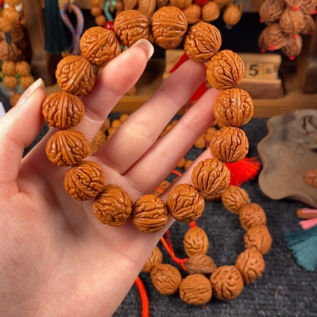 吊坠桃核桃枭手串