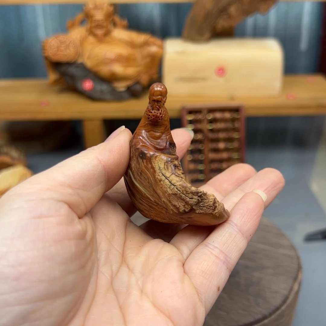 沐***柏木崖柏木摆件手把件