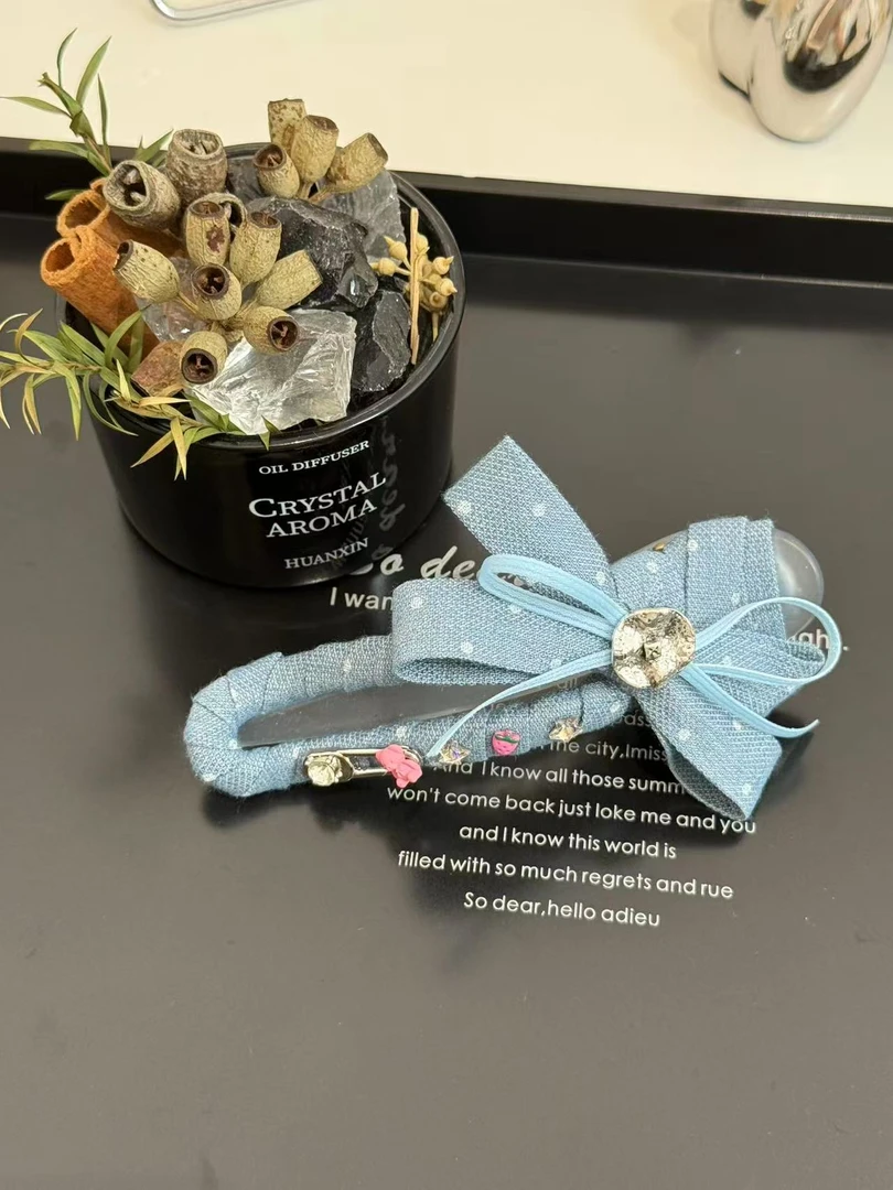 韩国东大门原单牛仔蝴蝶结一字夹SYJa9975