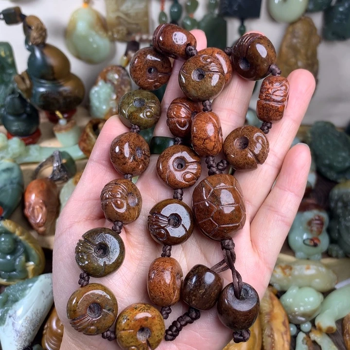 岫岩河磨玉（透闪石质玉）手持未镶嵌陋**学