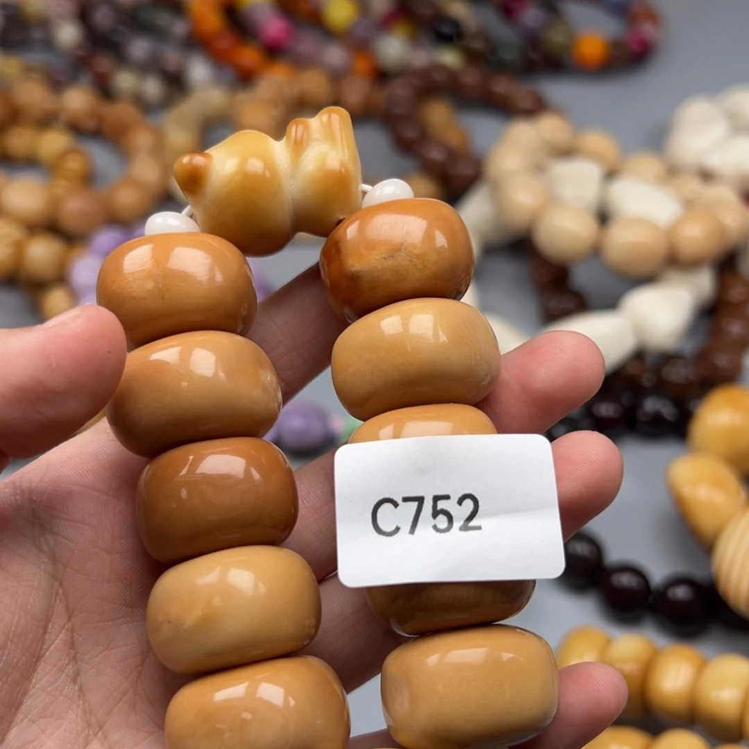 -***茂菩提根/象牙果吊坠C752方扣23-25瑕疵一串