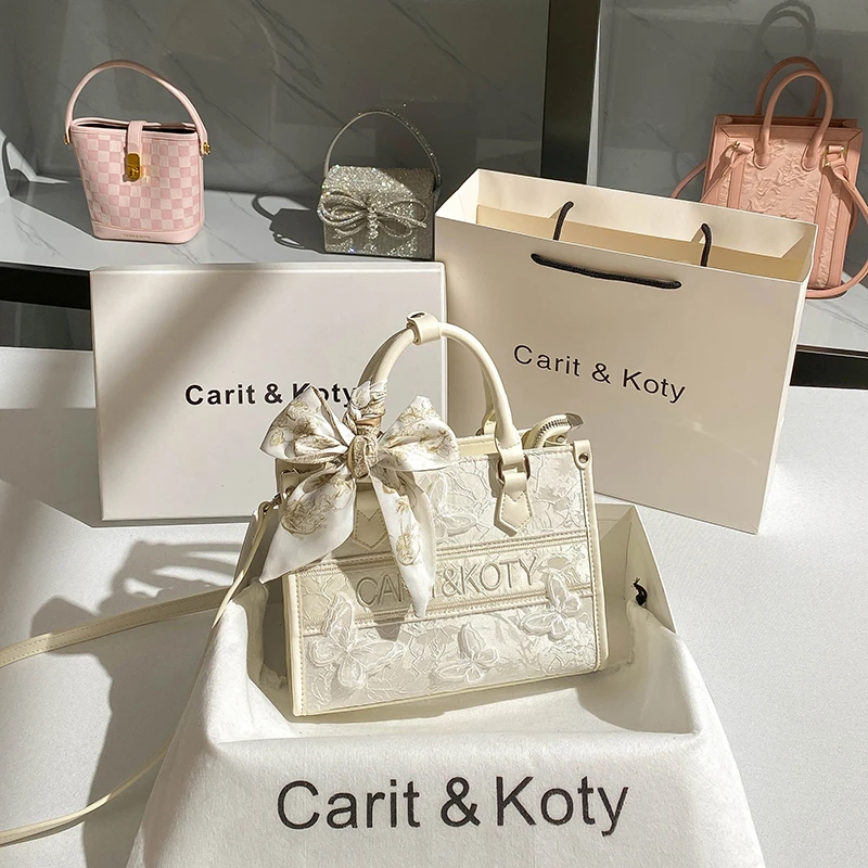 CaritKoty新中式蕾丝手提包包2025新款小众蝴蝶通勤小托特包斜挎