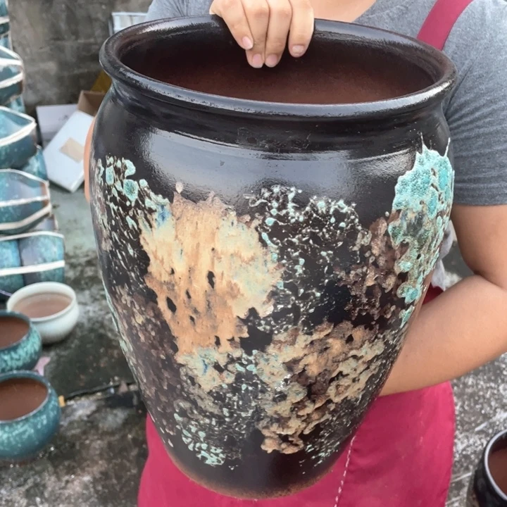 紫砂花盆口24高35瑕疵瑕疵大底裂