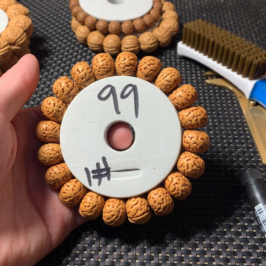 呵***呵桃核手串1号链接，