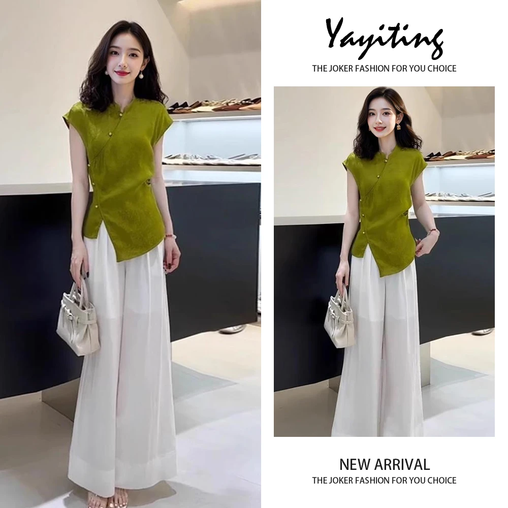 2025夏季气质优雅穿搭高级感不规则设计感绿色显白修身收腰上衣女