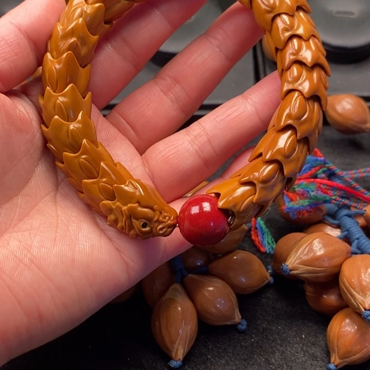 橄榄核把件龙骨手串