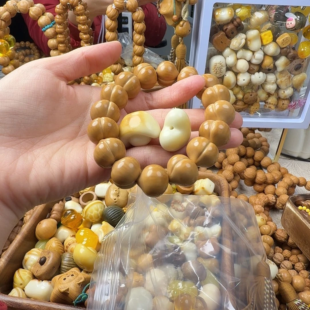 桃***笑菩提籽类猴头手串