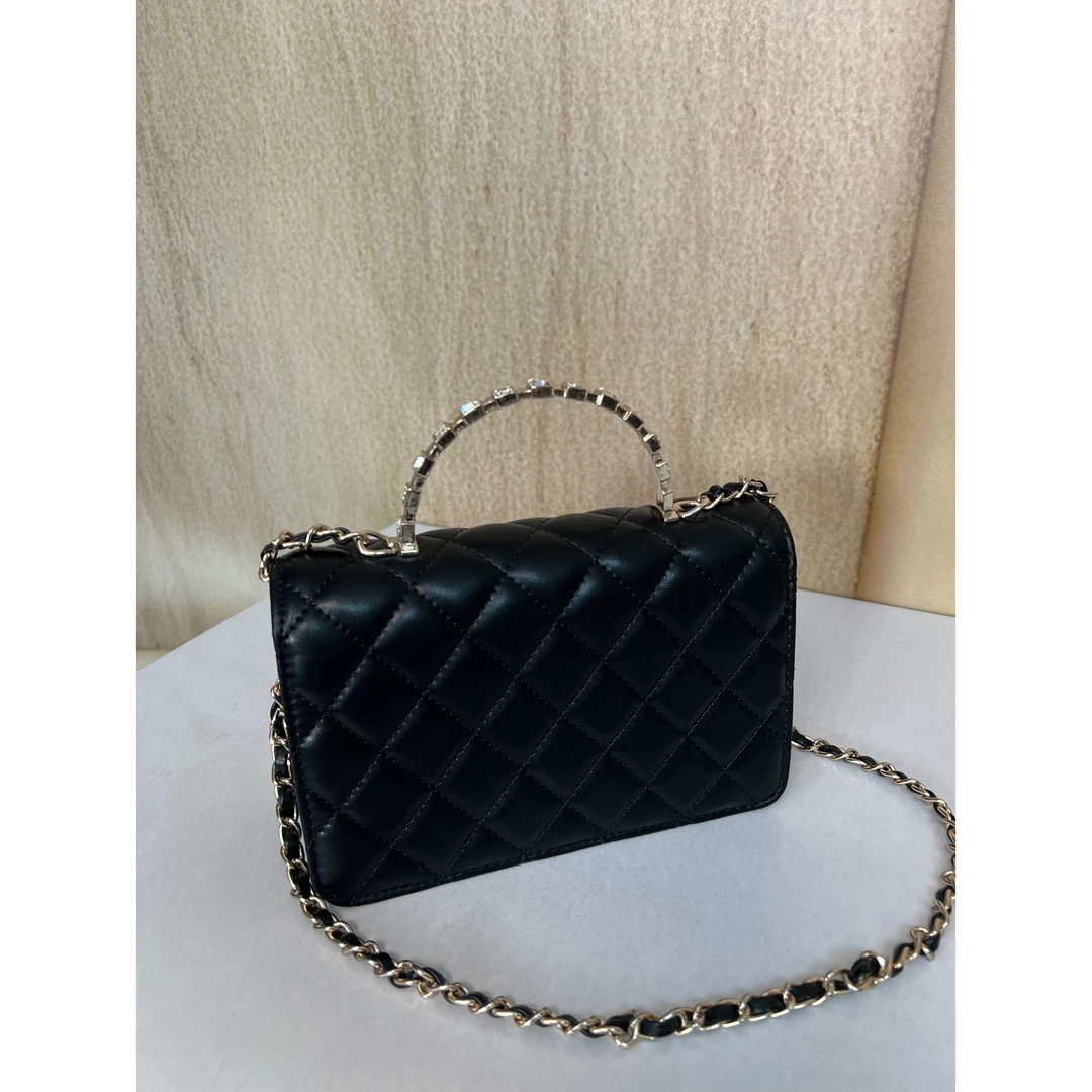 TOLEX2025新款时尚百搭卧手拎斜跨女包黑色钻手柄17.5cm