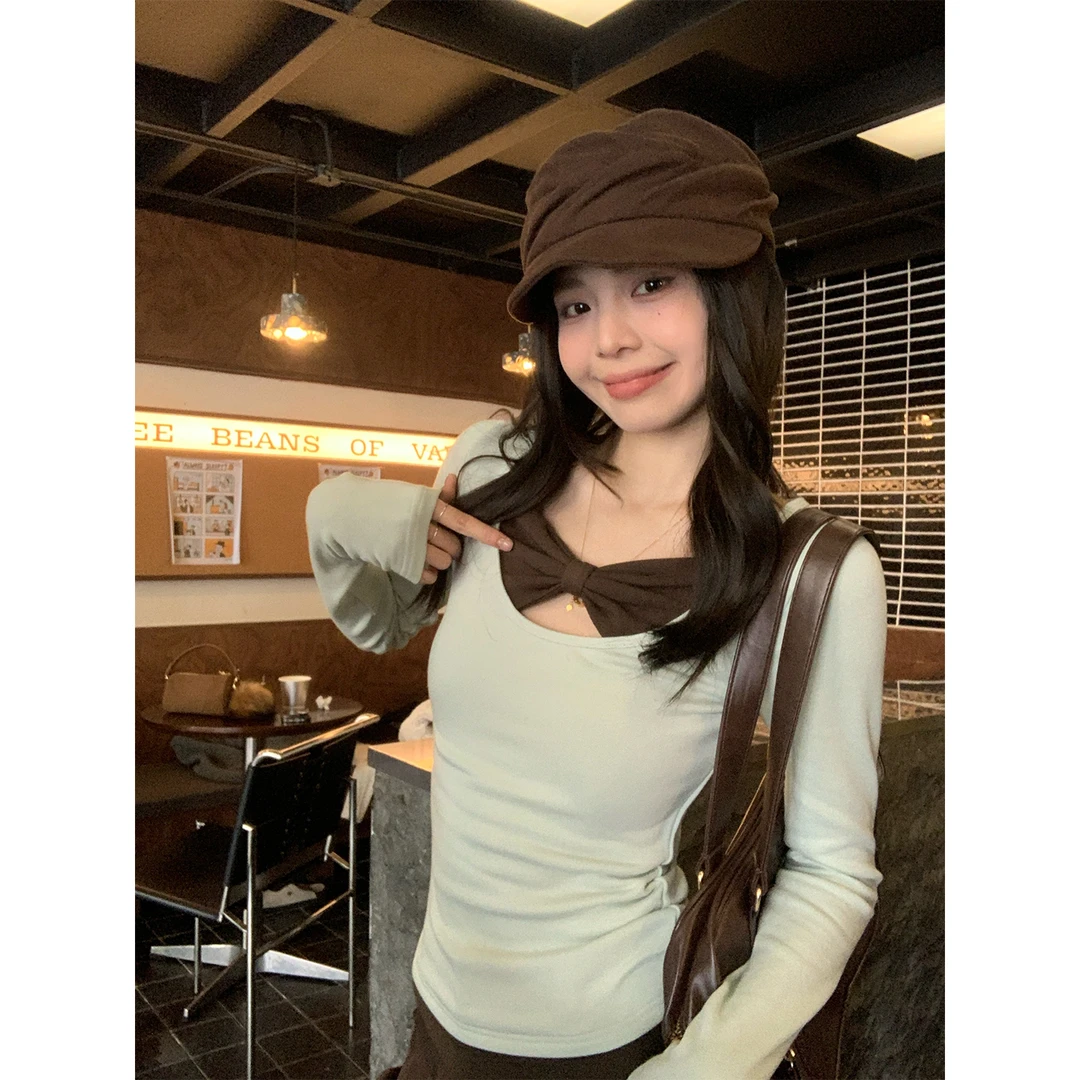 宋正恩12/15 10:00AM上新【设计款~绿咖拼色蝴蝶结镂空长袖T恤】