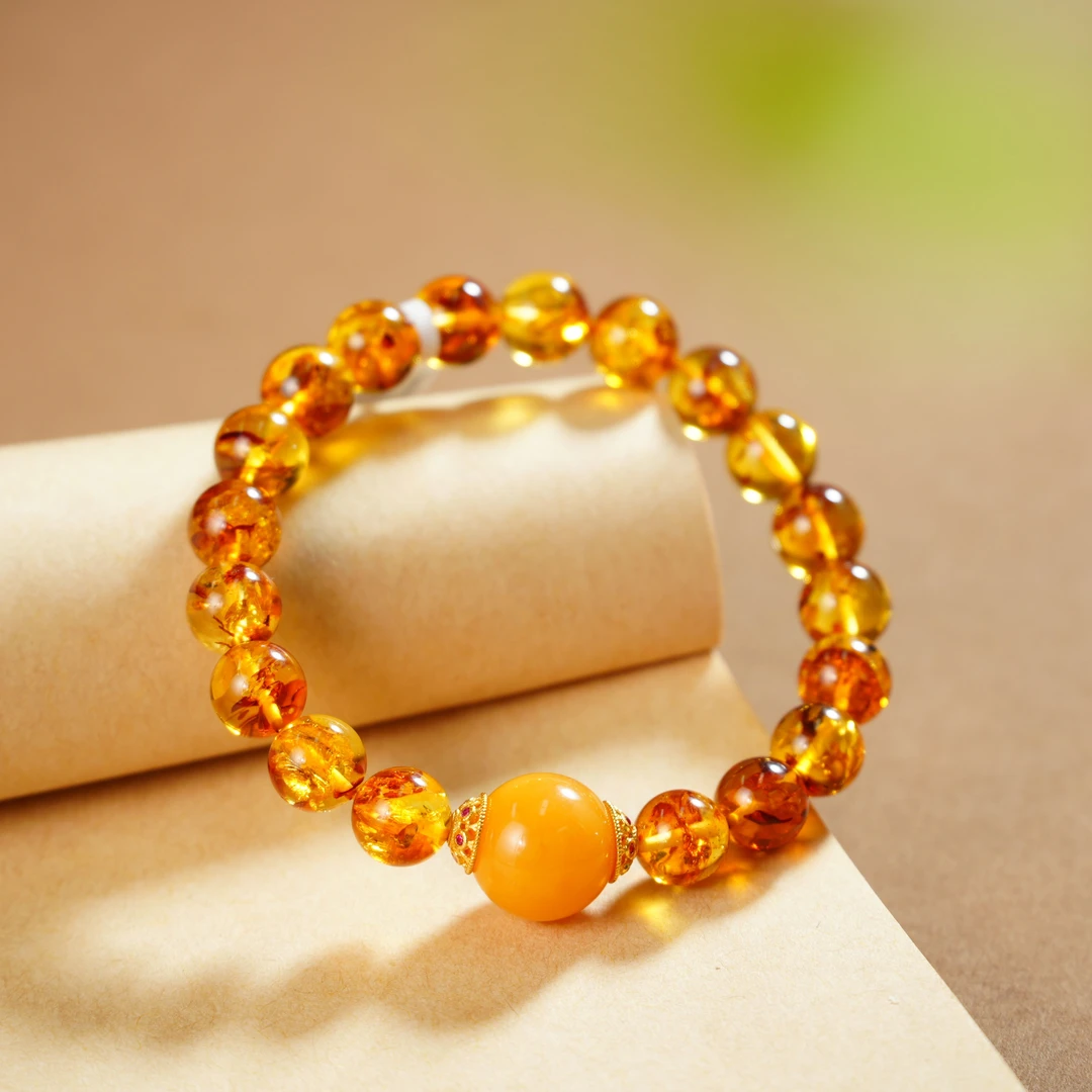 【老掌柜讲珠宝】蜜蜡枣珠花珀手串 S040208