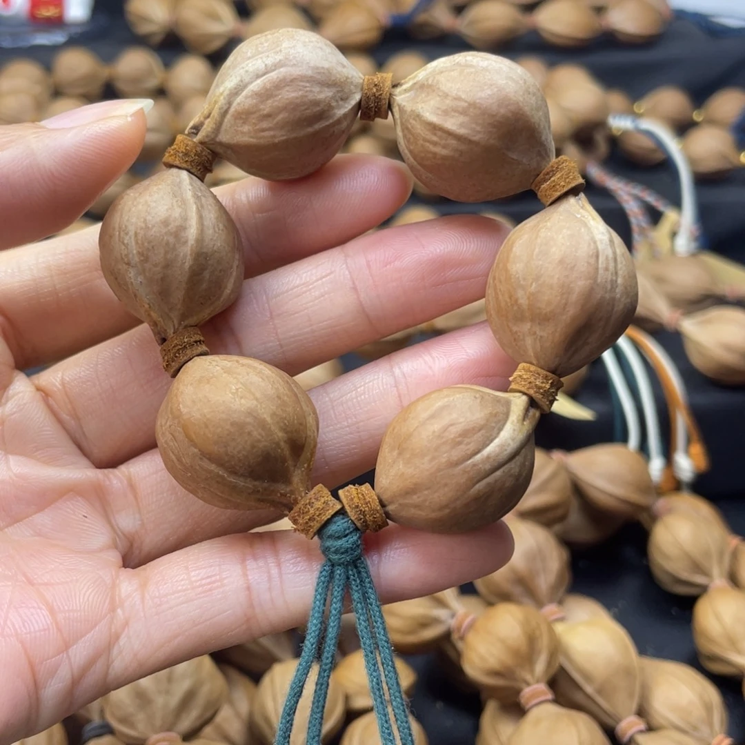 俩***爹003橄榄核三花21*26