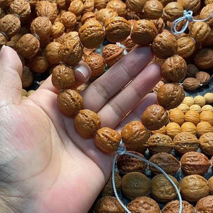白***团文玩核桃手串金豆子