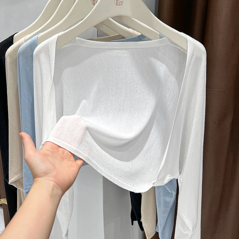 白色薄款简约长袖针织衫女2025夏季外搭配裙子修身防晒披肩短外套