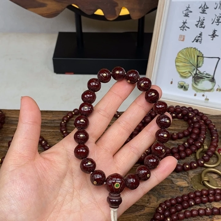 吊坠凤眼菩提12 带钉 手持