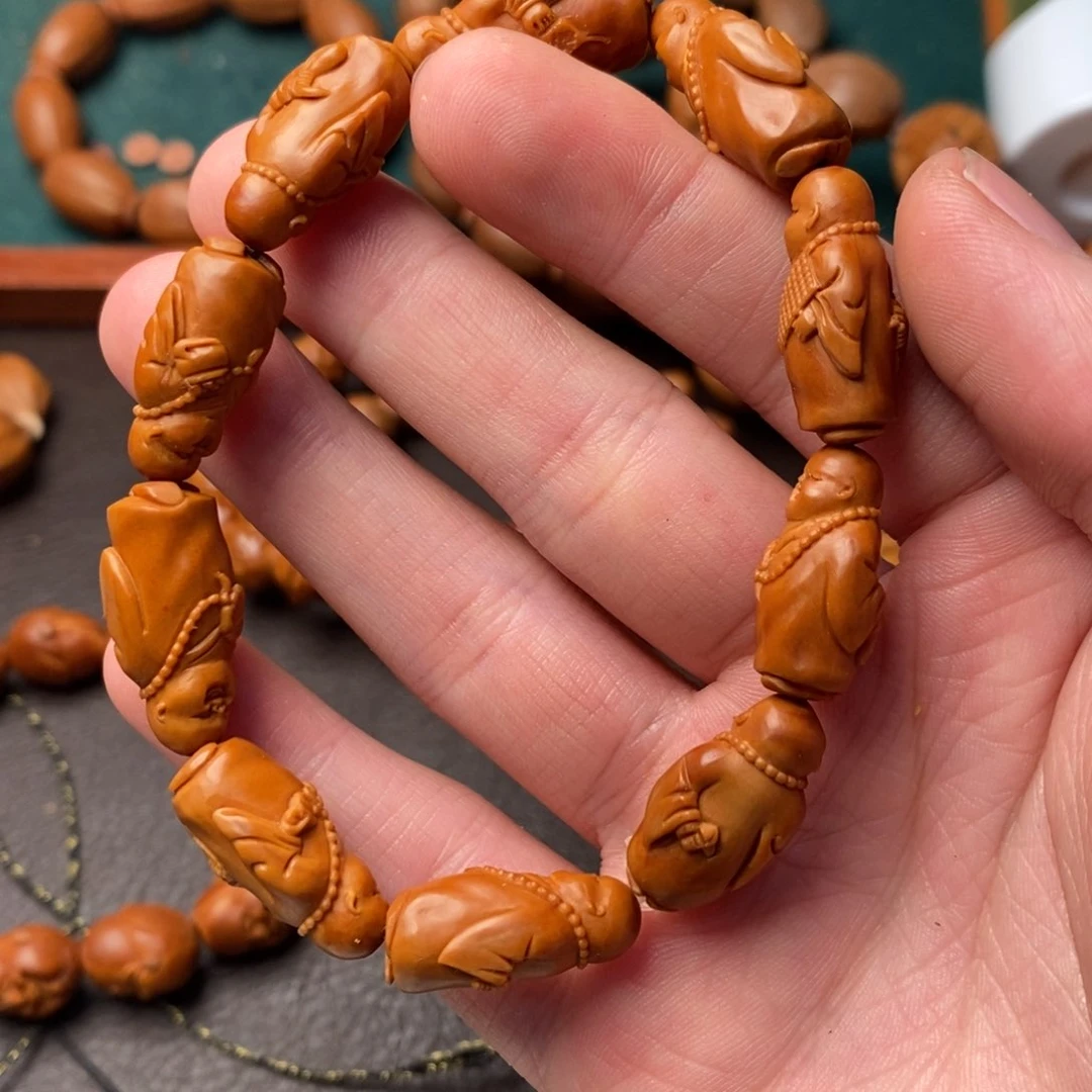 橄榄核吊坠逗*乐橄榄核