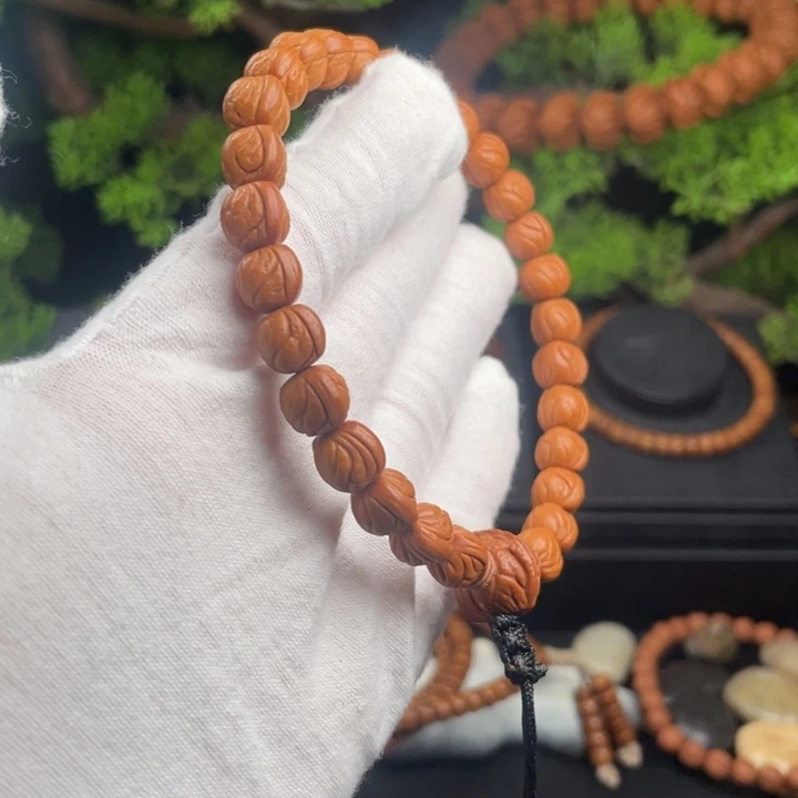 B***a桃核吊坠玉龙脊手持