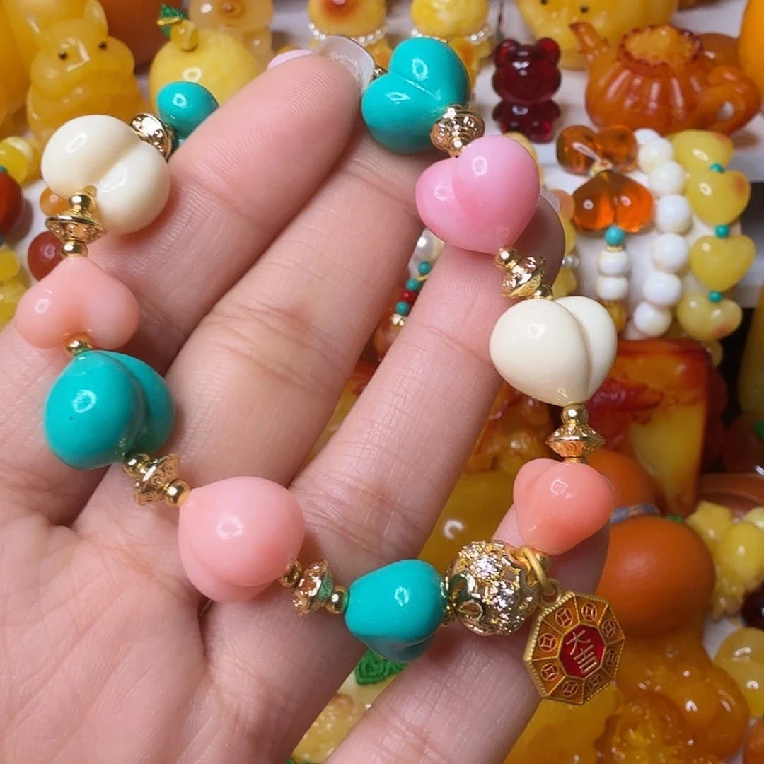 勤***聊非金属小不点屁桃手串