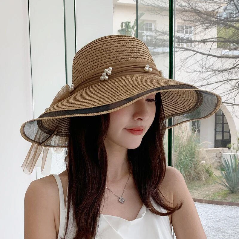 草帽女夏海边沙滩大檐遮阳帽新款户外出游休闲网纱珍珠飘带太阳帽
