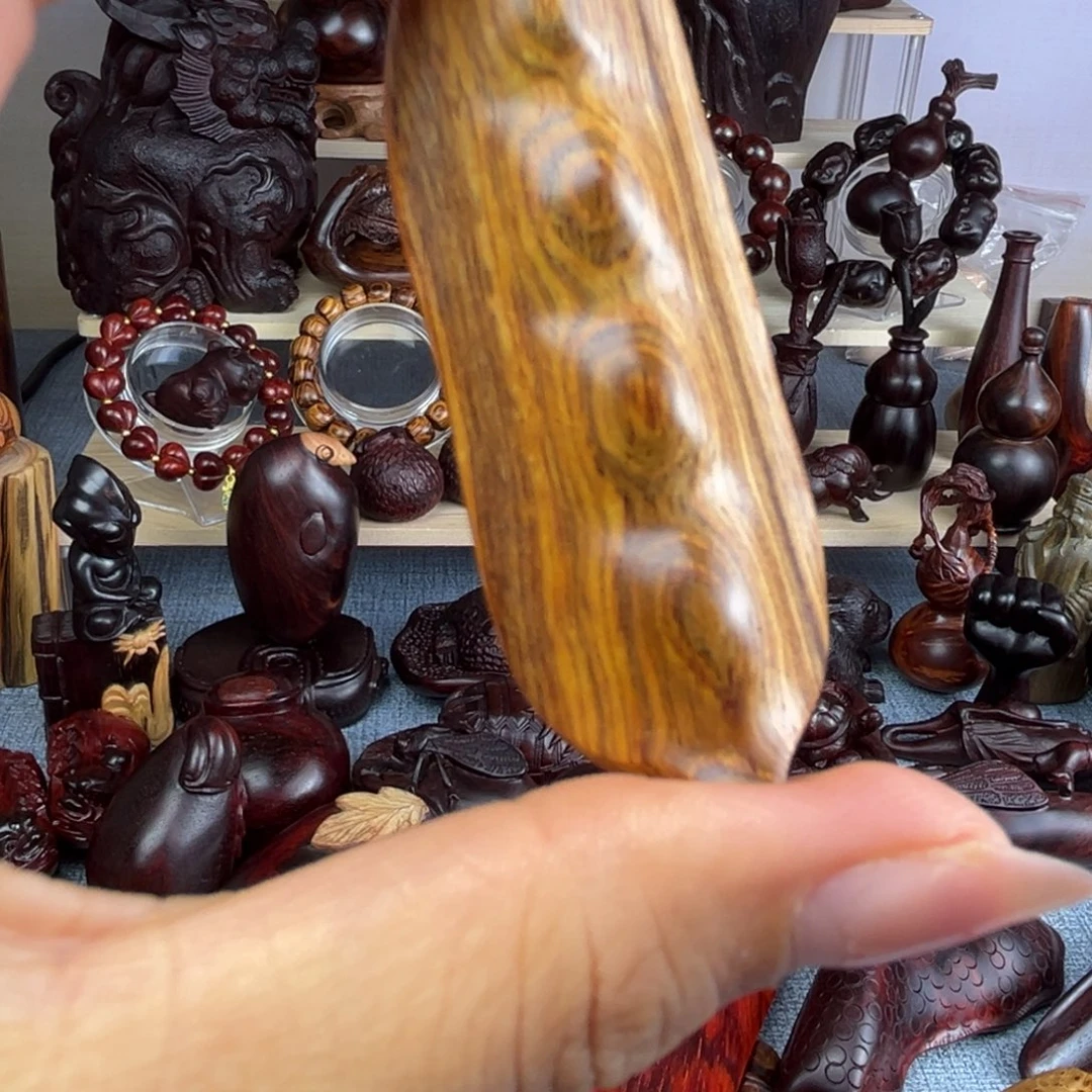 暖***阳香榧木黄花梨手工豆角一个