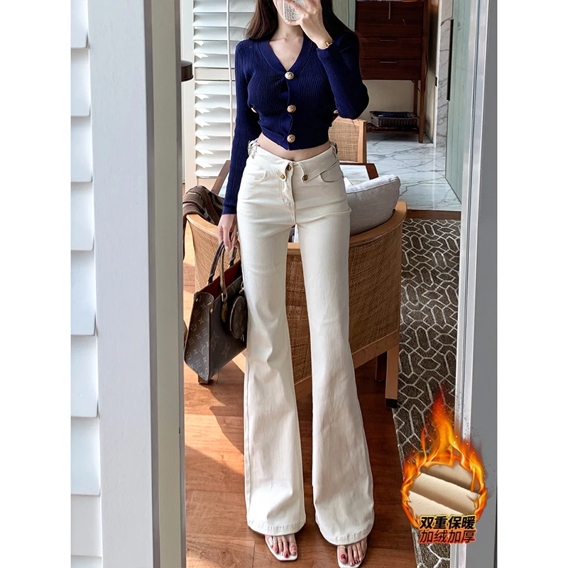 米白翻边字母加绒微喇牛仔裤女2025冬季新款高腰显瘦不贴腿长裤